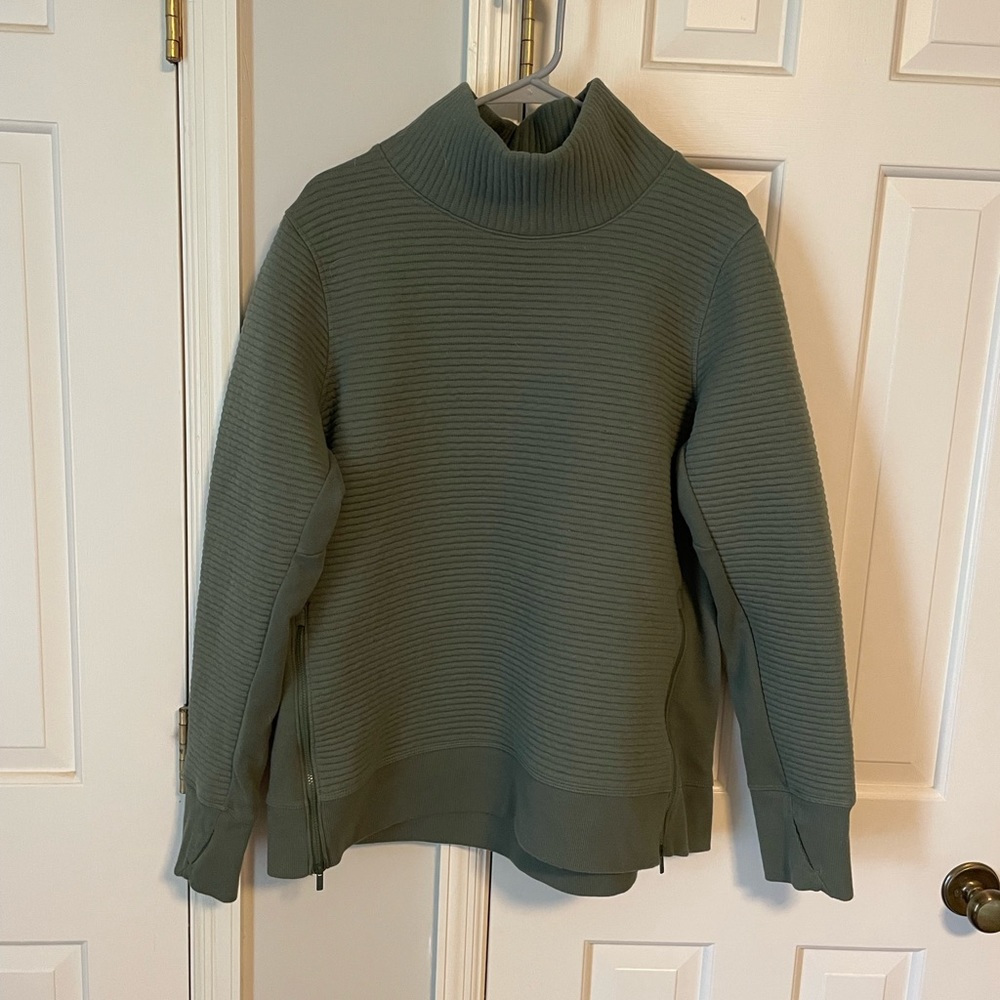 All in Motion athletic pullover. Finger holes in the sleeves & zippers on front